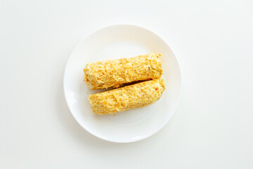 two napoleon cakes on white plate top view