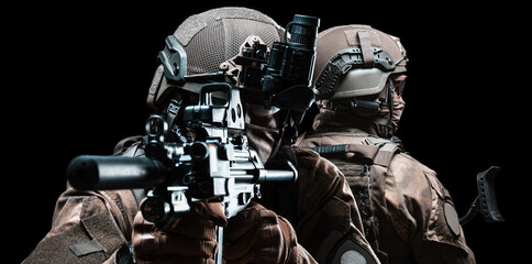 Armed special forces group on a dark background. Law and order protection concept. SWAT group. Antiterrorism.