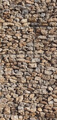Stone wall background. The texture of the stone wall. Wall of large stones.