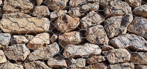 Stone wall background. The texture of the stone wall. Wall of large stones.