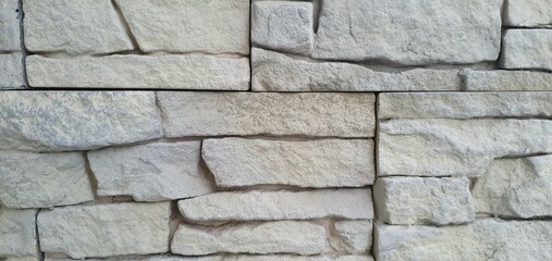 Brick wall texture. Stone wall texture. Stone background. Brick wall background. Geometric background. Geometric texture. Gray brick wall.