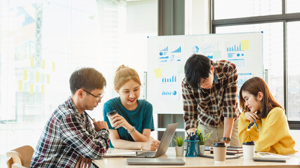 Start up meeting entrepreneurship new business asian businesswoman taking and discussing at desk.