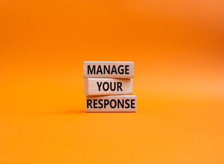 Manage your response symbol. Concept words Manage your response on wooden blocks. Beautiful orange background. Business and Manage your response concept. Copy space