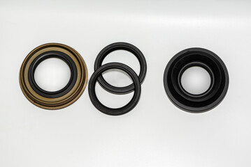 Automotive rubber oil seals spare parts isolated on white background.