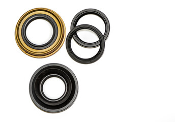 Automotive rubber oil seals spare parts isolated on white background.