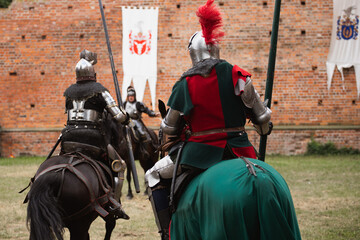 knights on horseback - obrazy, fototapety, plakaty