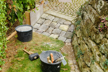 Pavement works, Cobbled pavement natural stone. preparation for installing concrete paver blocks...