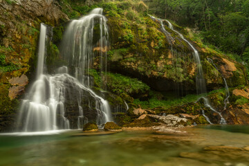 Beautiful color summer waterfall Virje in Slovenia Alps