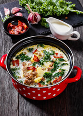 Zuppa Toscana,Tuscan Soup in red pot, top view