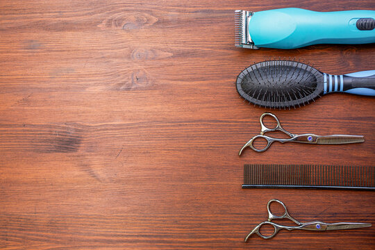 some grooming tools on wooden background