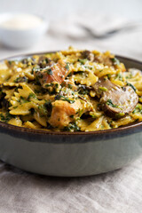 Homemade One-Pot Chicken and Mushroom Pasta in a Bowl, side view. Close-up.