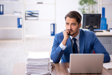 Young businessman employee working in the office