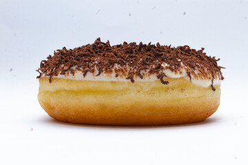 Doughnuts with colorful sprinkles isolated on white background top view
