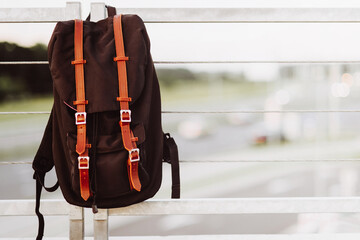 Hipster backpack closeup. View from front tourist traveler bag on urban background. - 518193111