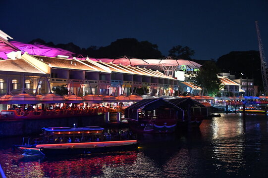 Clarke Quay, Singapore - July 16, 2022: The Famous and Beautiful Clarke Quay beside The Singapore River