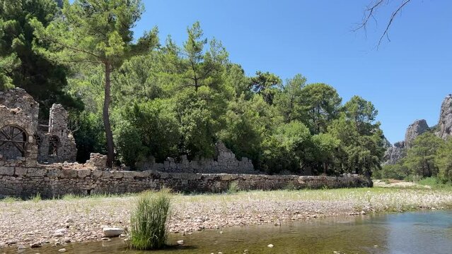 Olympos ancient city, historical ruins, river and mountain views. Antalya Turkey