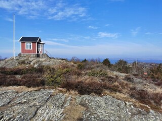 a small house on the hill of the island of Branno