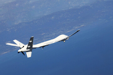 Unmanned aerial vehicle, UAV, in the sky. Elements of this image furnished by NASA