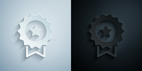 Paper cut Medal with star icon isolated on grey and black background. Winner achievement sign. Award medal. Paper art style. Vector