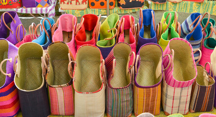 Obraz premium Colorful straw bags at a market in Provence,France Souvenirs
