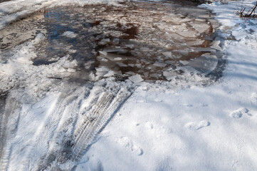 Off-road melted snow and deep thawed areas