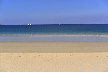 Fototapeta na wymiar Colour stripes: Sky, Sea, Wet sand and dry sand