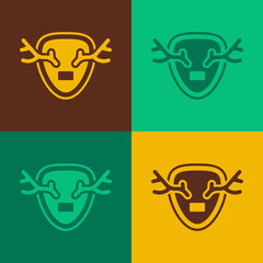 Pop art Deer antlers on shield icon isolated on color background. Hunting trophy on wall. Vector