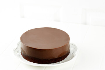 Chocolate Brownie Pudding, Two Layer Chocolate Cake on White Plate