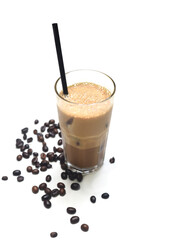 Iced milk espresso with coffee beans on white background closeup