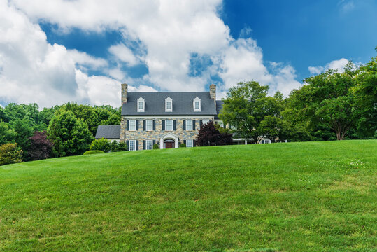  Luxurious stone country house for a large family. with a large lawn and landscaping.