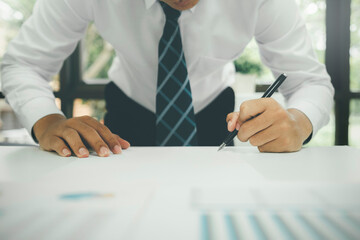 Businessman is thinking and analyse planing the strategy.