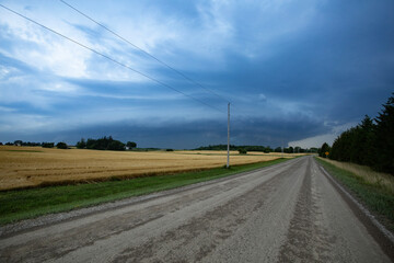 Fototapeta premium Thunder storm front clouds summer evening