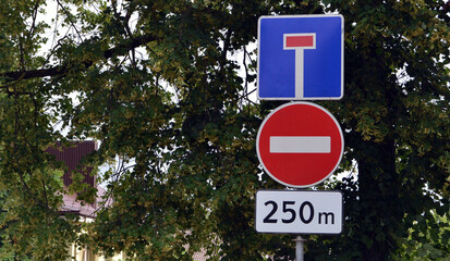 Traffic signs: Do not enter and this road is a dead end, round and rectangular plate in blue, red...