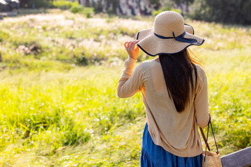 Fototapeta premium Woman visit the scenery view under sunlight