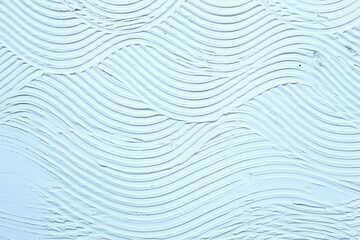 Fototapeta na wymiar Striped pattern on a white wall