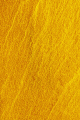 Gold slate stone texture for background.
