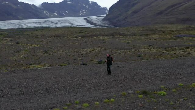 Man in Iceland Drone Circeling near Glacier