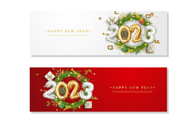 Happy new year 2023 balloon numbers on green fir branches set background
