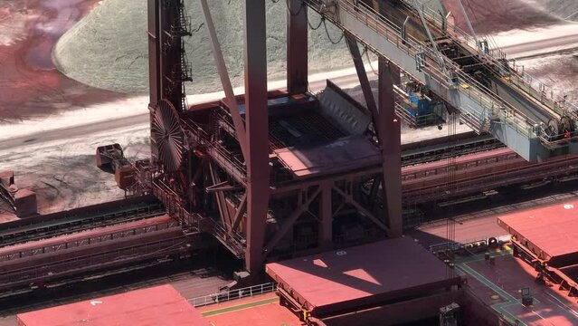 Cranes Unloading Cargo from a Bulk Carrier Ship at Port