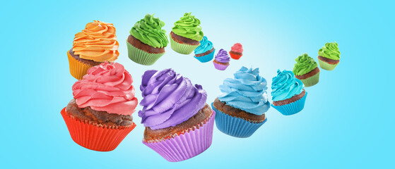 Many flying birthday cupcakes on blue background