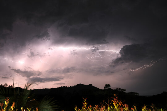 Composite image of a lightning bolt during a storm.