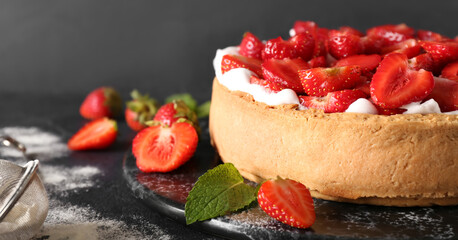 Plate with tasty strawberry cake on table, closeup