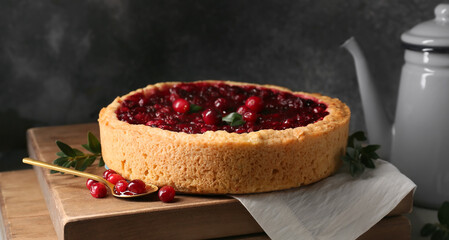 Delicious homemade lingonberry pie on table