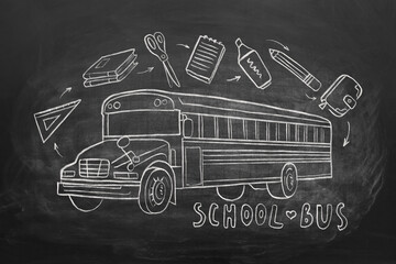 School bus and stationery drawn on blackboard