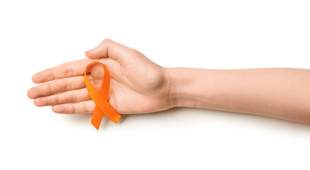 Woman with orange awareness ribbon on white background. Kidney cancer concept