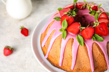 Dessert stand with tasty strawberry cake on table, closeup