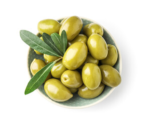 Bowl of tasty green olives isolated on white background