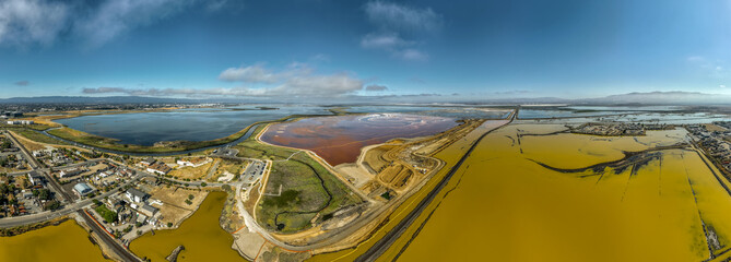 Aerial panorama view of Alviso district in San Jose California with rundown buildings colorful...