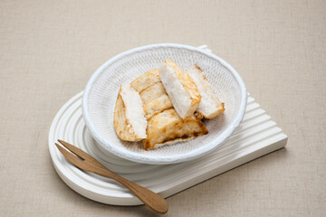 Kue Pancong, Gandos or Bandros is an Indonesian traditional snack made from a mixture of rice flour, grated coconut, and coconut milk.