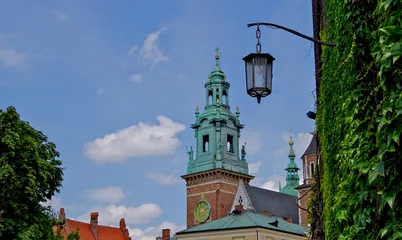 Fototapeten Krakow, Poland popular tourist travel destination with impressive skyline of old town historic architecture and Wawel Castle, Marienchurch outdoor landmarks urban street avenue for shopping © Tamme